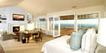 upholstered sofa, chairs, tailored bed skirt, boxed pillows shams with cord trims