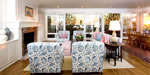 upholstered tight back lounge chairs, ottomans and sofa. down pillows