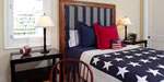 upholstered headboard, tailored bed skirt, bed shams